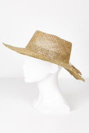 A model wearing size OneSize of the Tigerlily Wide Brim Hat in colour Seagrass, from the front, showing the whole outfit