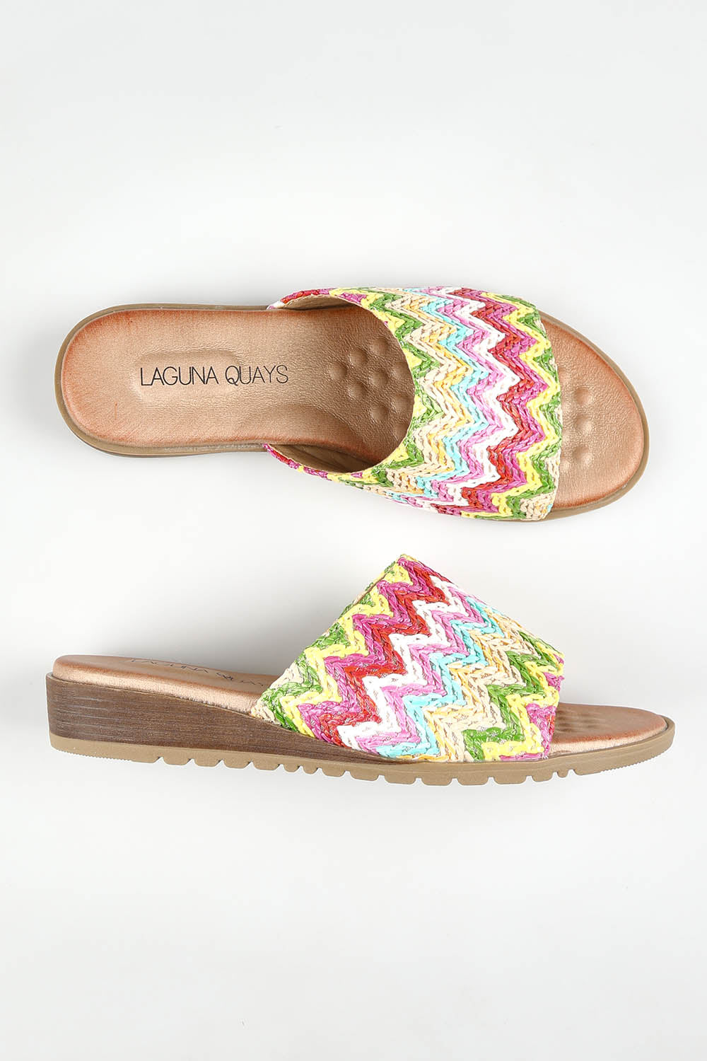 A model wearing size 37 of the Ganni Slide in colour Brightmult (Pink), from the front, showing the whole outfit
