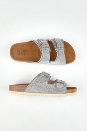 A model wearing size 37 of the Twain Slide in colour Silverdia (Grey), from the front, showing the whole outfit
