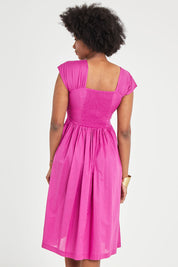 Model Aiyana wearing size S of the Leanne Dress in colour Violet (Purple), from the back