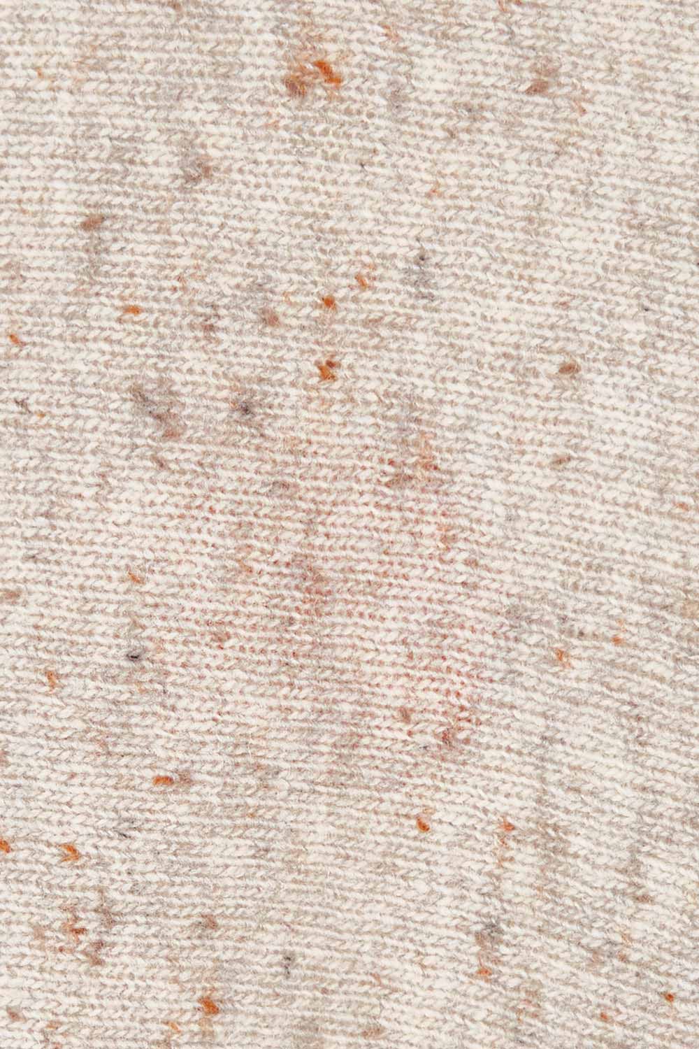 Product shot of the Whirlwind Jumper in colour Earth, detail