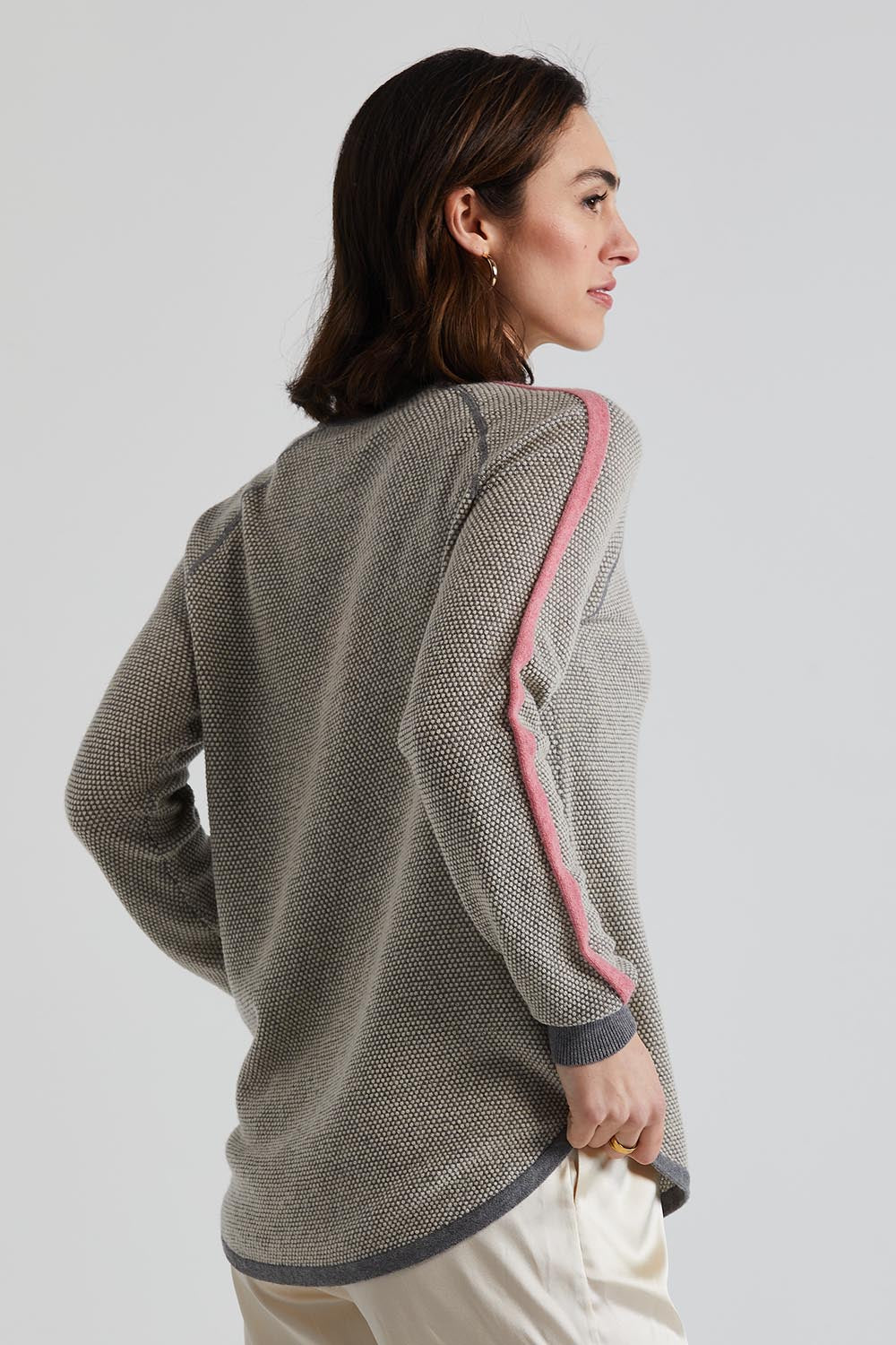 A model wearing the Waffle Lambswool Crew in colour Marl (Grey), from the front, cropped image