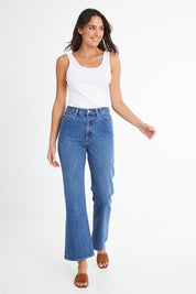 Model Madeline wearing size 10 of the Hi Flare in colour Goodvibes (Blue), from the front, showing the whole outfit