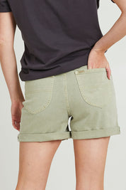 Model Grace wearing size 10 of the Girlfriend Short in colour Thyme (Green), from the back