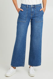 Model Madeline wearing size 10 of the Mid Vintage Wide Leg in colour Indigo (Blue), from the front, cropped image
