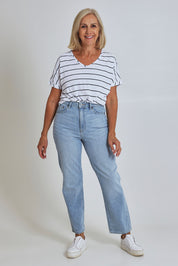 Model Sandy wearing size 10 of the Riders Hi Straight Leg Jean in colour Fadedblue (Blue), from the front, showing the whole outfit