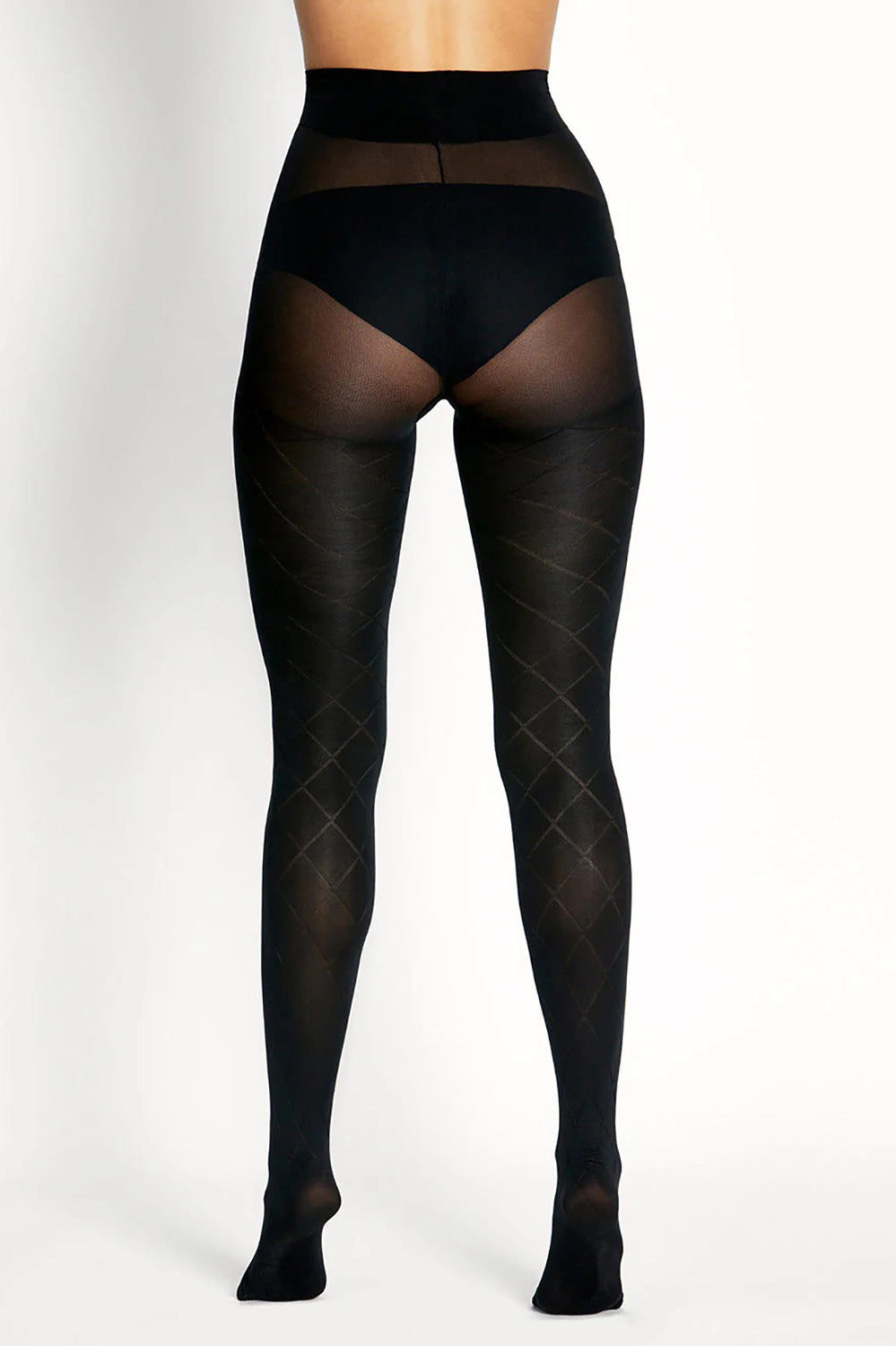 A model wearing the Alaria Fuller Figure Tight in colour Nero (Black), from the back