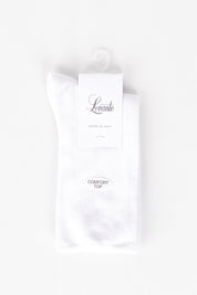 A model wearing size OneSize of the Comfort Top Sock in colour White (White), from the front, showing the whole outfit