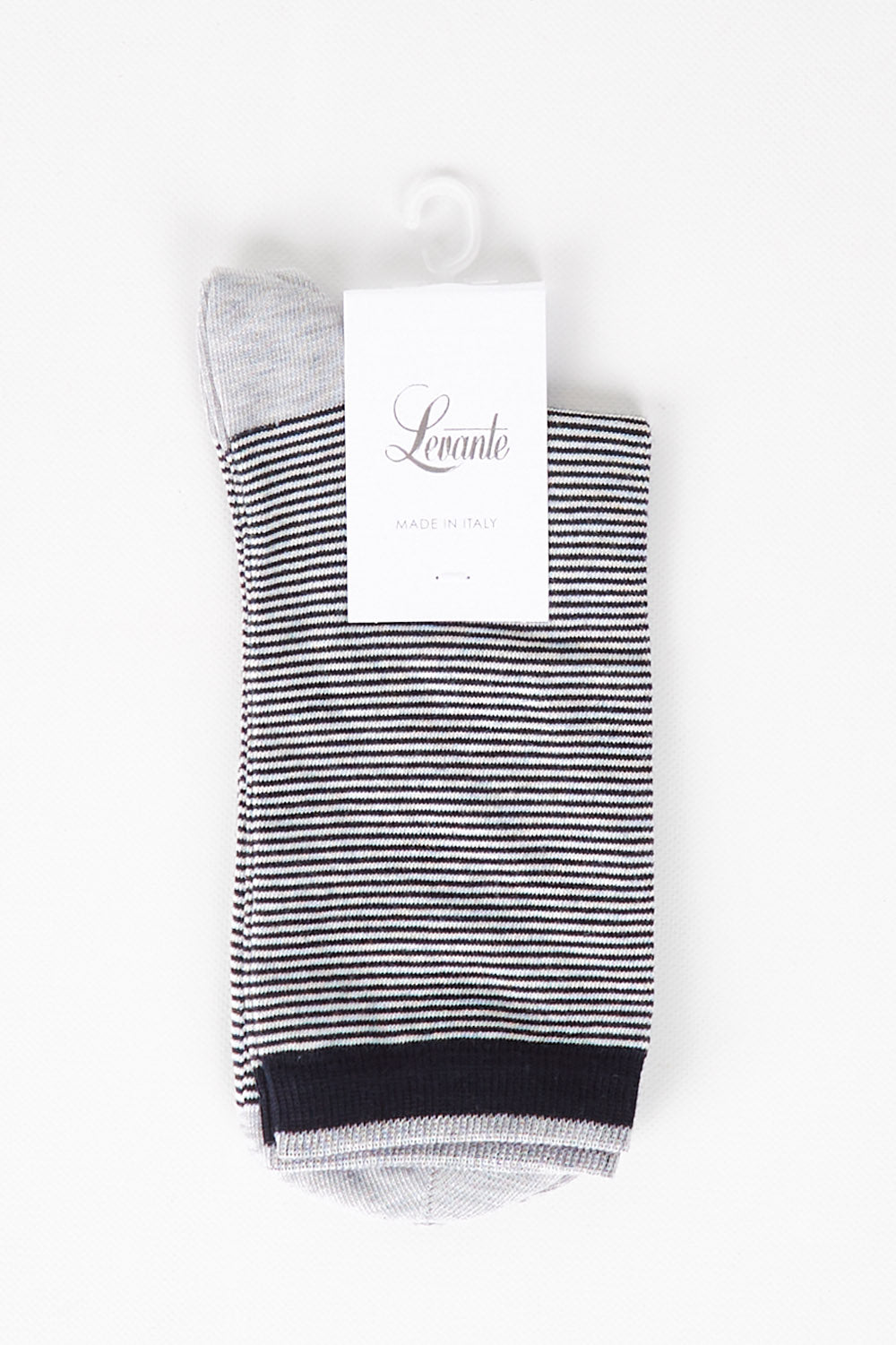 A model wearing size OneSize of the Lina Fine Stripe Crew Sock in colour Ink (Blue), from the front, showing the whole outfit