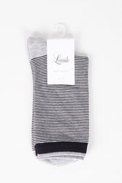 A model wearing size OneSize of the Lina Fine Stripe Crew Sock in colour Ink (Blue), from the front, showing the whole outfit