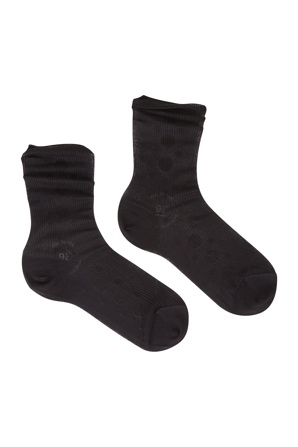 Product shot of the Rib Midi Sock in colour Nero (Black), from the front