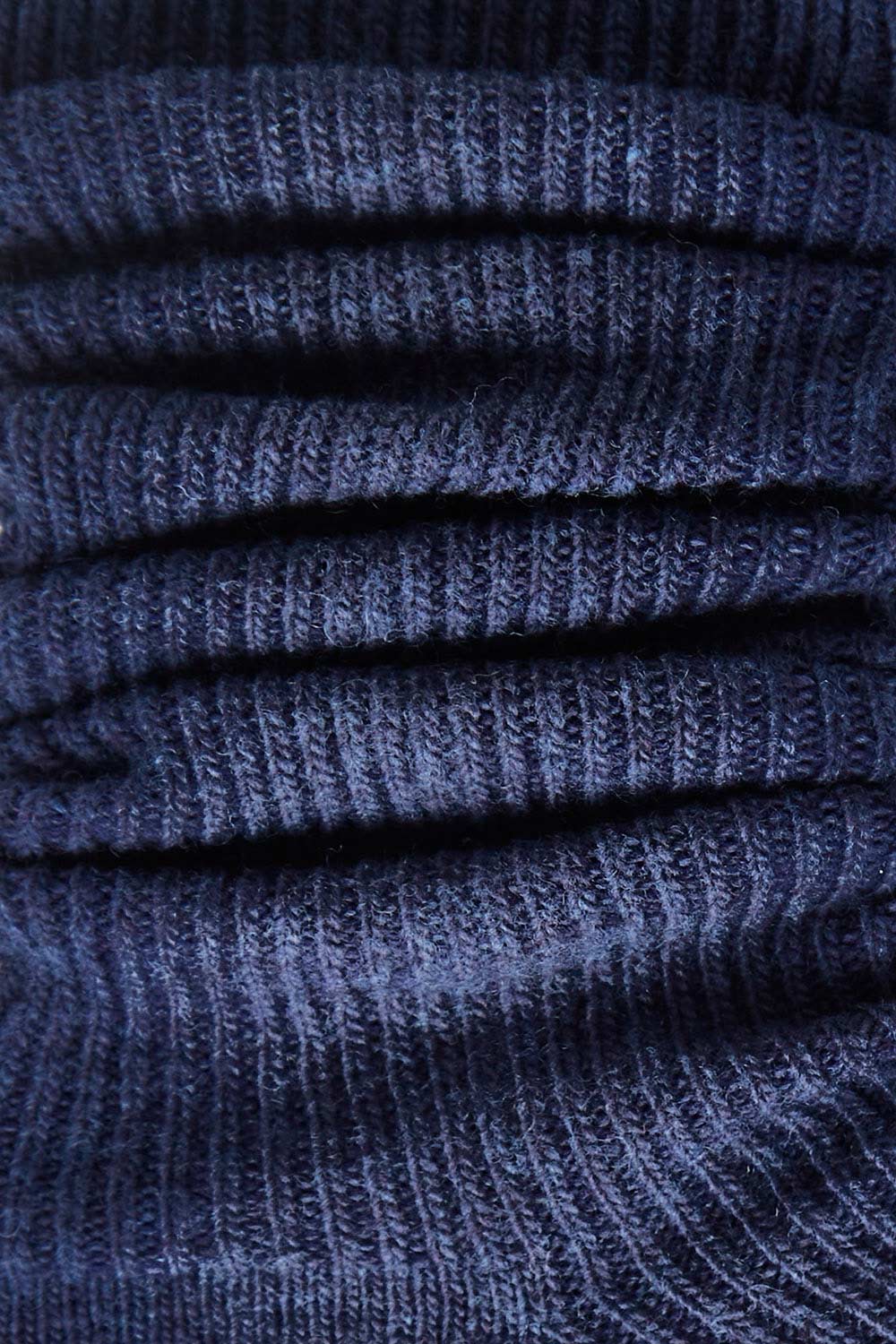 Product shot of the Slouchy Sock in colour Ink (Blue), detail