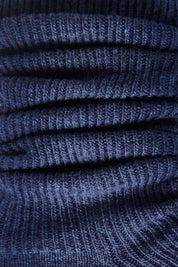 Product shot of the Slouchy Sock in colour Ink (Blue), detail