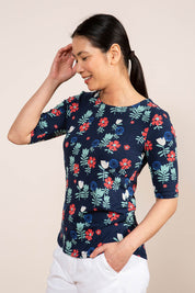 A model wearing the Rockpool Top in colour Navy (Blue), from the front, cropped image