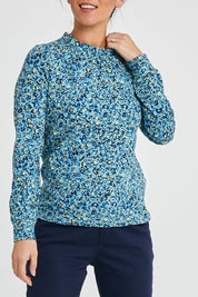 Model Katie wearing size 10 of the Bracelands Top in colour Teal (Green), from the front, cropped image