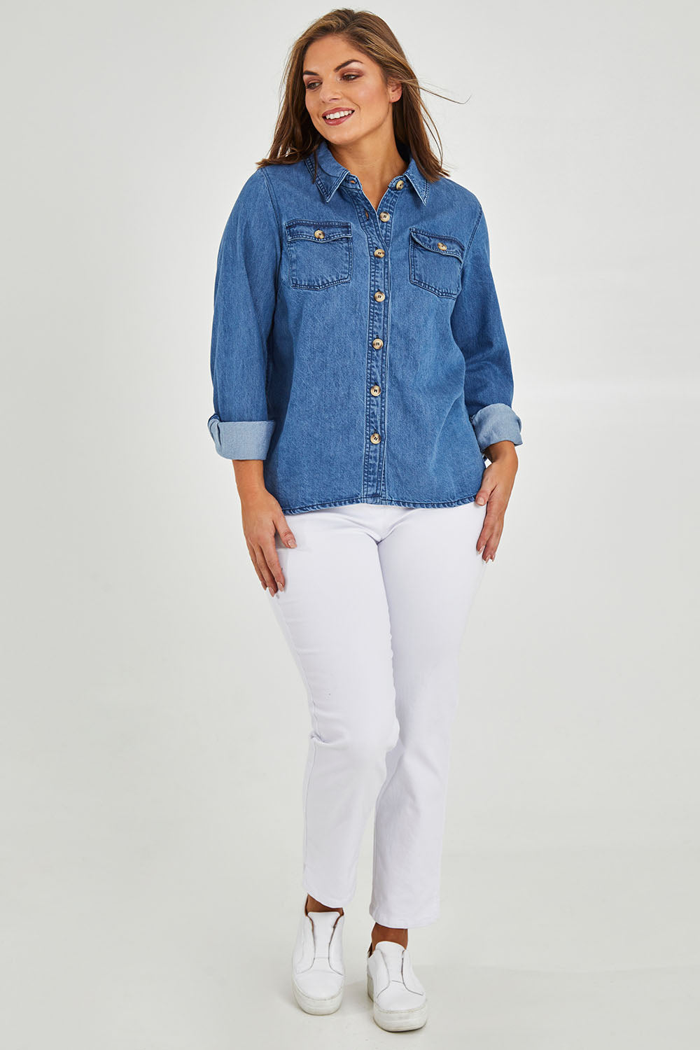 Model Monique wearing size 14 of the Rowan Shacket in colour Blue (Blue), from the front, showing the whole outfit