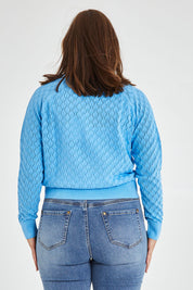 Model Monique wearing size 14 of the Eclipse Cardi in colour Skyblue (Blue), from the back