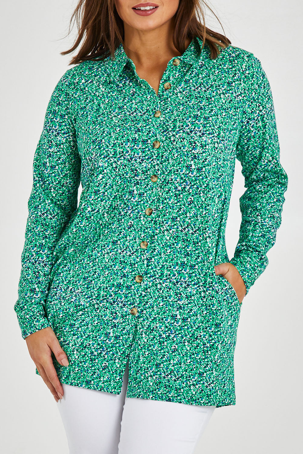 Model Monique wearing size 14 of the Grange Tunic in colour Bgreen (Green), from the front, cropped image
