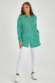 Model Monique wearing size 14 of the Grange Tunic in colour Bgreen (Green), from the front, showing the whole outfit