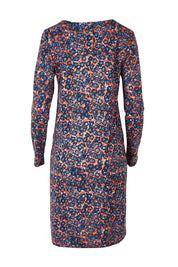 Product shot of the Maisemore Dress in colour Floret (Blue), from the back