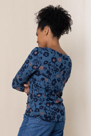 A model wearing the Abigail Top Cuckoo in colour Blue (Blue), from the back