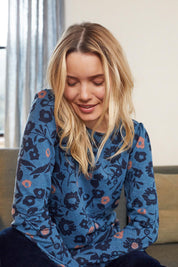A model wearing the Abigail Top Cuckoo in colour Blue (Blue), from the front, showing the whole outfit