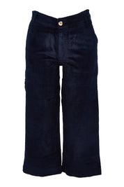 Product shot of the Isla Crop Cotton Cord Trouser in colour Navy (Blue), from the front