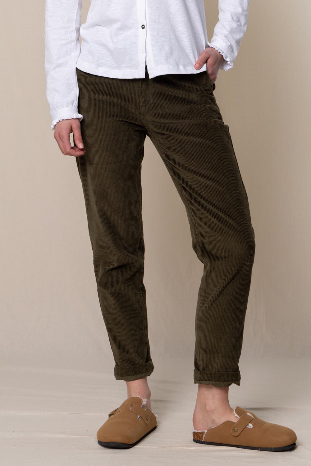 A model wearing the Brookend Cotton Cord Trouser in colour Olive (Green), from the front, cropped image