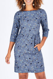 Model Summer wearing size 10 of the Keep It Simple Dress in colour SteelBlue (Blue), from the front, cropped image