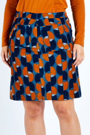 Model Jess wearing size 14 of the Annabelle Cord Skirt in colour Blueginger (Blue), from the front, cropped image