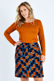 Model Jess wearing size 14 of the Annabelle Cord Skirt in colour Blueginger (Blue), from the front, cropped image
