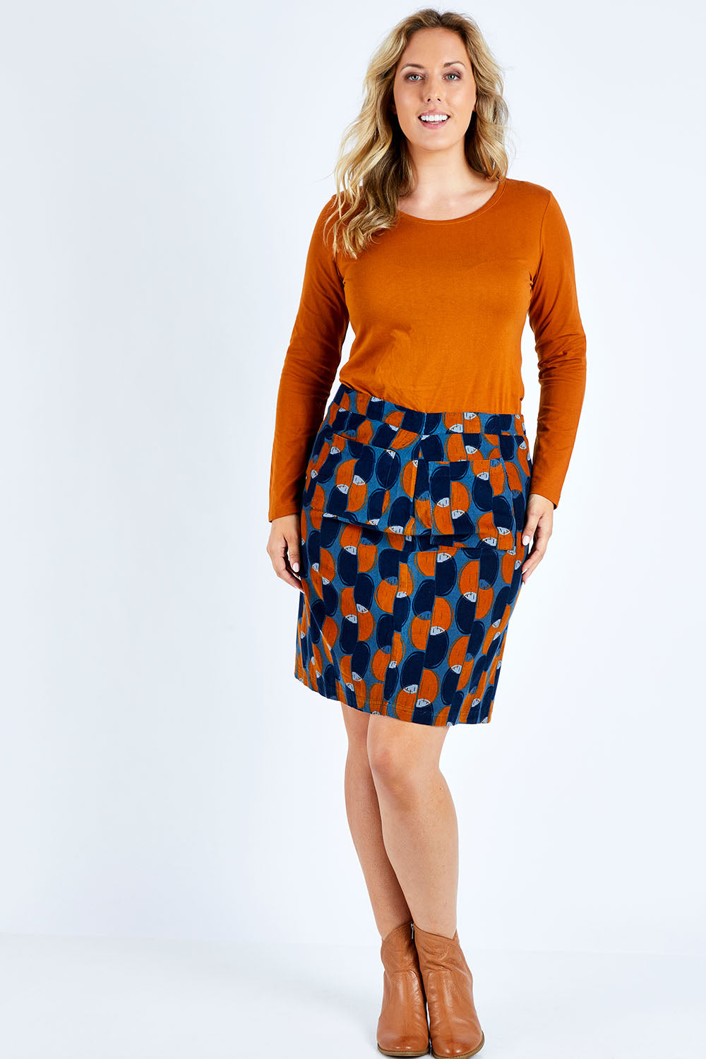 Model Jess wearing size 14 of the Annabelle Cord Skirt in colour Blueginger (Blue), from the front, showing the whole outfit