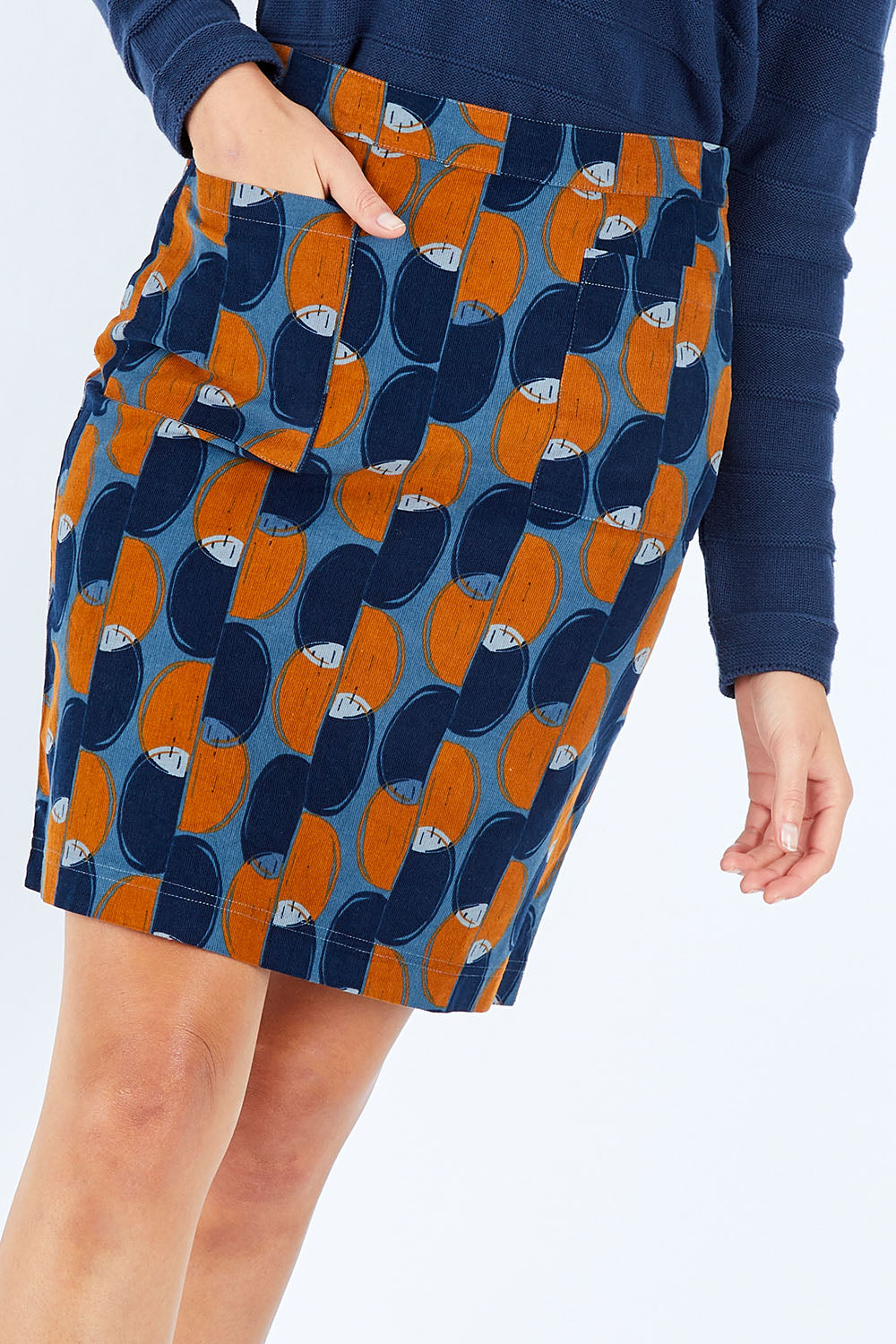 Model Madeline wearing size 10 of the Annabelle Cord Skirt in colour Blueginger (Blue), from the front, cropped image