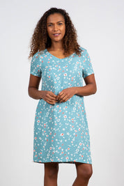 A model wearing the Seascape Dress in colour Seafoam (Blue), from the front, cropped image
