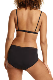A model wearing the Luna Leaks Midi Brief in colour Black (Black), from the back