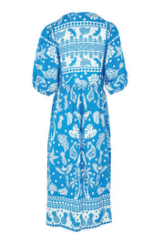 Product shot of the Agatha Midi Cotton Dress in colour Ocean (Blue), from the back