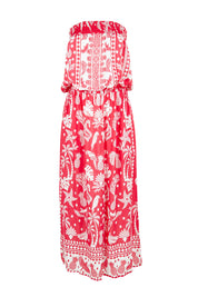 Product shot of the Agatha Strapless Dress in colour Melon (Red), from the front