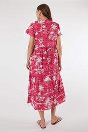 Model Genericm wearing size sample of the Alura Midi Dress – Melon in colour Melon, from the front