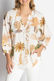 A model wearing the Amrita Cotton Shirt in colour White (White), from the front, cropped image