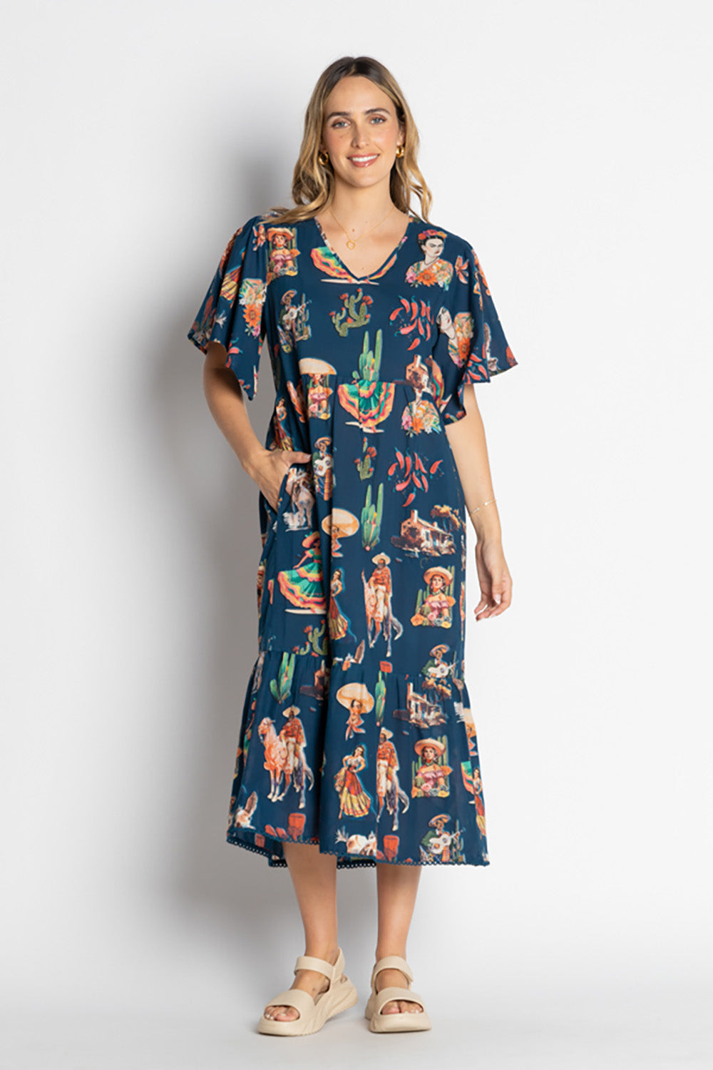 A model wearing the Arriba Cotton Midi Dress in colour Navy (Blue), from the front, showing the whole outfit