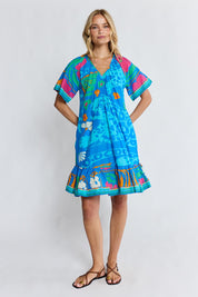 Model Genericm wearing size sample of the Ashanti Dress – Ocean in colour Ocean, from the front