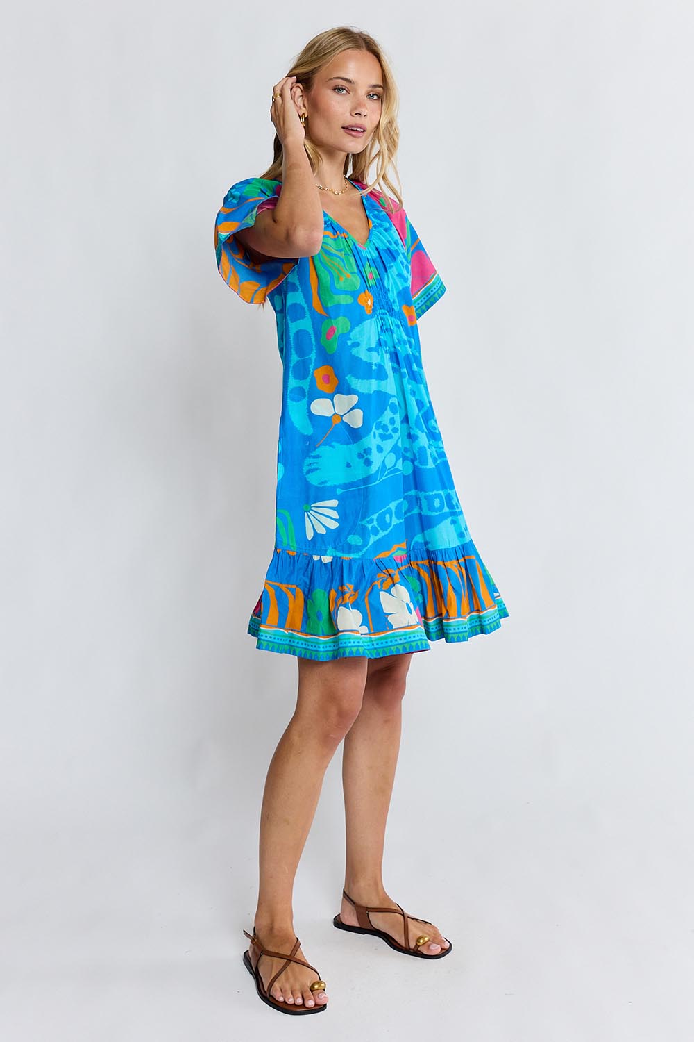 Model Genericm wearing size sample of the Ashanti Dress – Ocean in colour Ocean, from the front