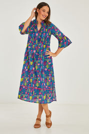 Model Georgia wearing size S of the Ashton Maxi Dress in colour Navy (Blue), from the front, showing the whole outfit