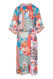 Product shot of the Asmara Shirtdress in colour Ocean, from the back