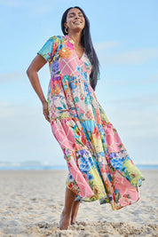 Model Eshan wearing size 10 of the Astrid Midi Dress – Dustypink in colour Dustypink, from the front