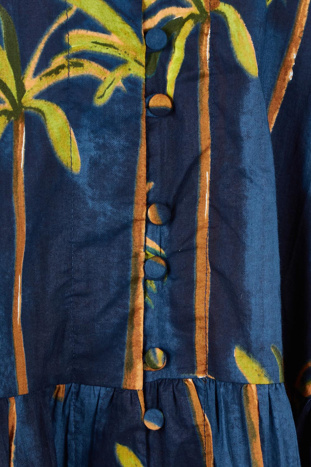 Product shot of the Badira Cotton Dress in colour Navy (Blue), detail