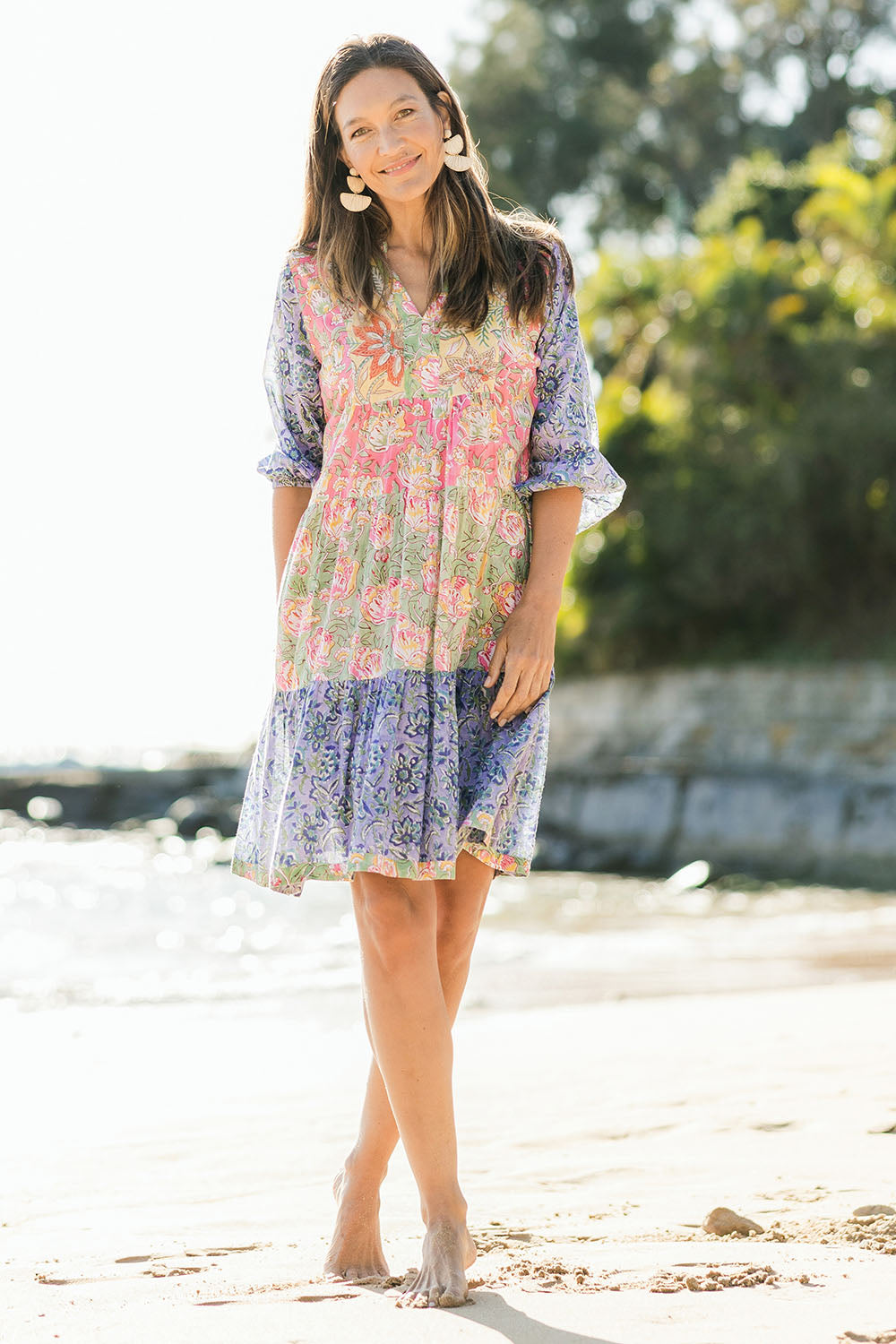 Model Alex wearing size S of the Bessie Dress in colour Multi (Blue), from the front, showing the whole outfit