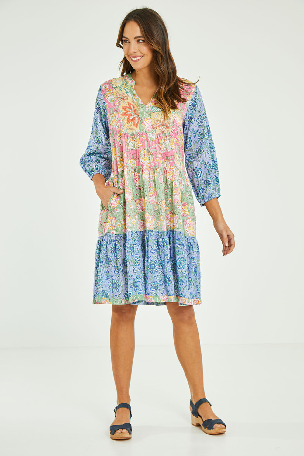 Model Madeline wearing size S of the Bessie Dress in colour Multi (Blue), from the front, showing the whole outfit