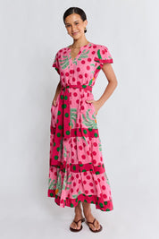 Model Genericm wearing size sample of the Blanch Midi Dress – Melon in colour Melon, from the front