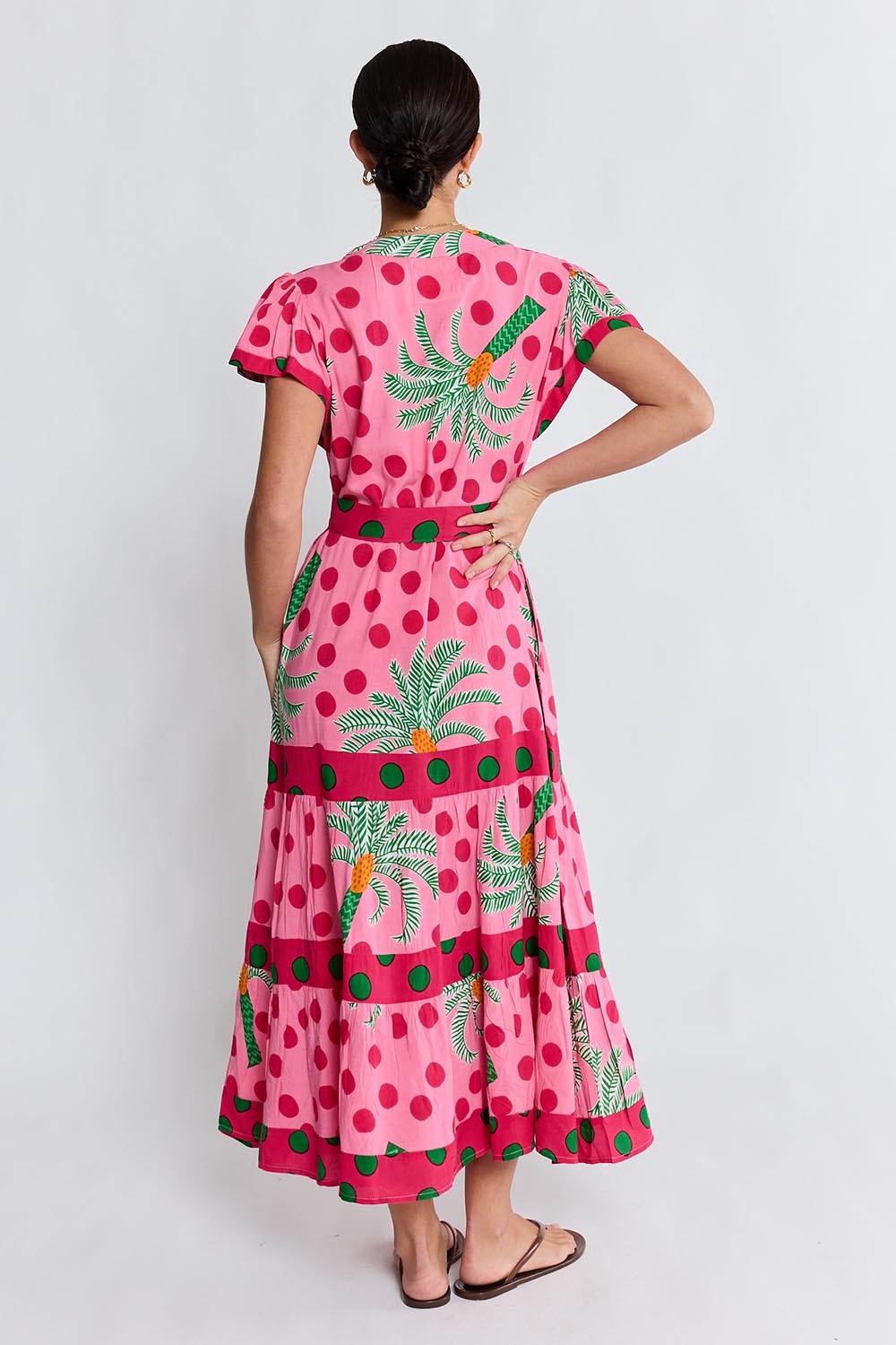 Model Genericm wearing size sample of the Blanch Midi Dress – Melon in colour Melon, from the front